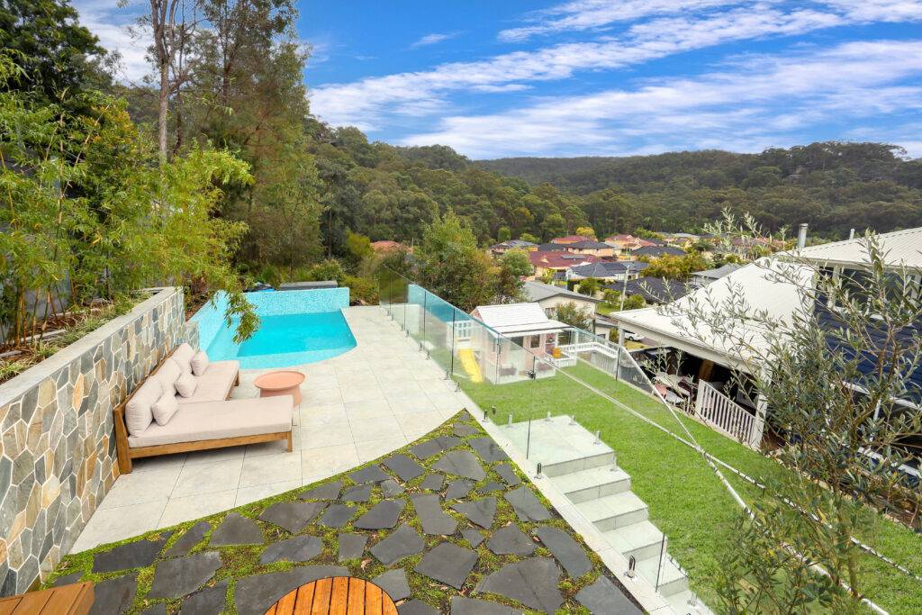 Splash pool, playhouse and patio